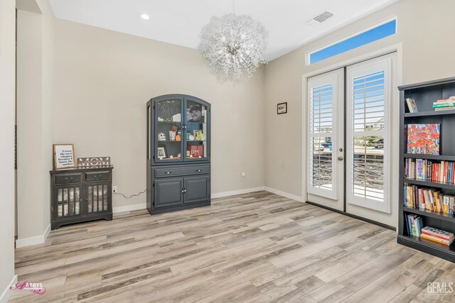 802 Barre Ct, Bakersfield, CA 93314 - unfurnished dining area with light wood-style flooring, a chandelier, and recessed lighting