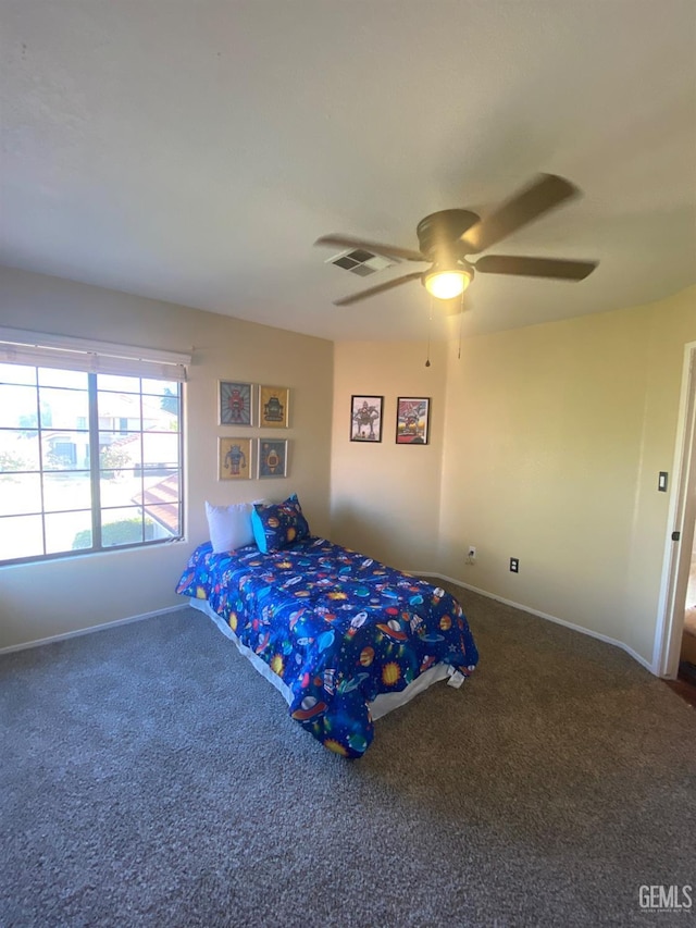 carpeted bedroom featuring ceiling fan