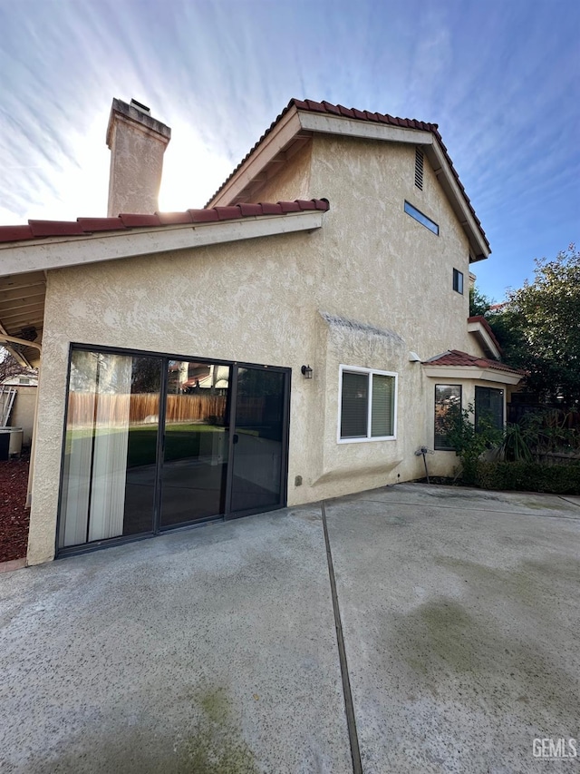 back of house with a patio area