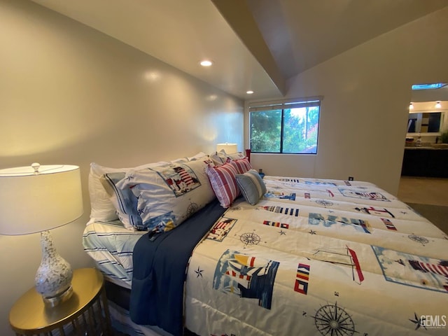 bedroom with lofted ceiling