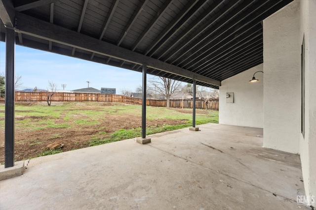 view of patio / terrace featuring fence