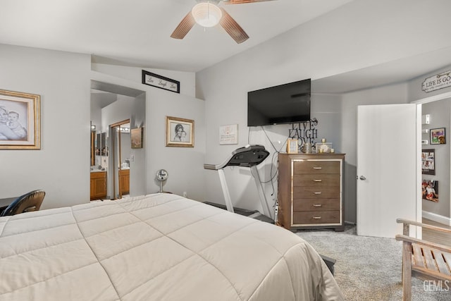 5000 Rogue Water Ct, Bakersfield, CA 93313 - carpeted bedroom featuring vaulted ceiling, connected bathroom, and a ceiling fan