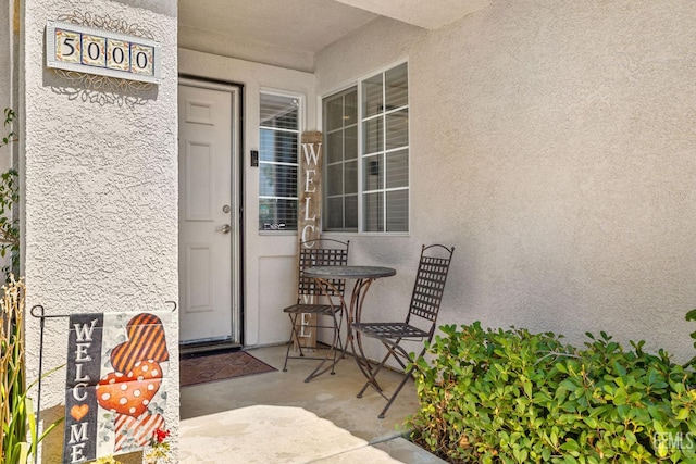 5000 Rogue Water Ct, Bakersfield, CA 93313 - property entrance featuring stucco siding