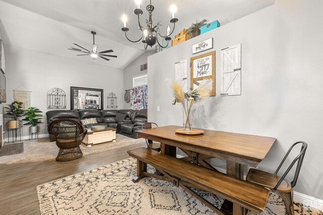 5000 Rogue Water Ct, Bakersfield, CA 93313 - living area with wood finished floors, lofted ceiling, a chandelier, and a ceiling fan