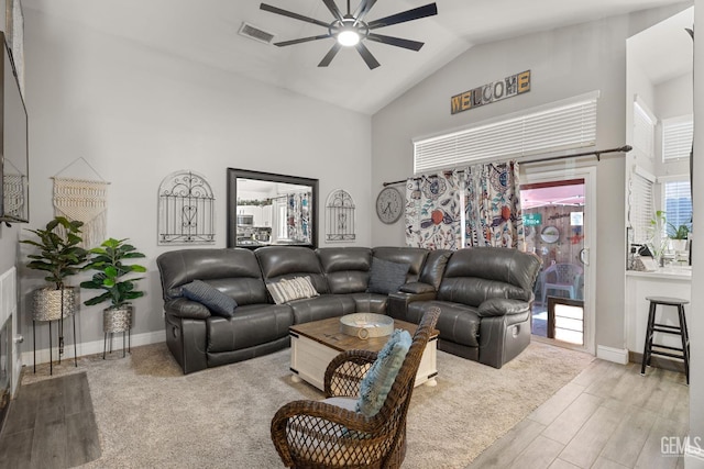 5000 Rogue Water Ct, Bakersfield, CA 93313 - living area with a ceiling fan, high vaulted ceiling, and wood finished floors