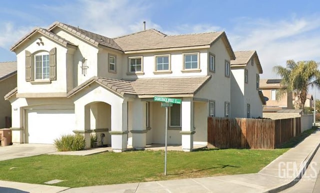 5400 Saddleback Ridge Ct, Bakersfield, CA 93313 - view of front of home with stucco siding, a garage, a tile roof, and driveway