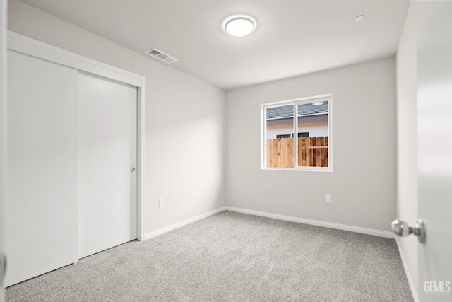618 Poinsettia St, Bakersfield, CA 93307 - unfurnished bedroom featuring carpet floors and a closet