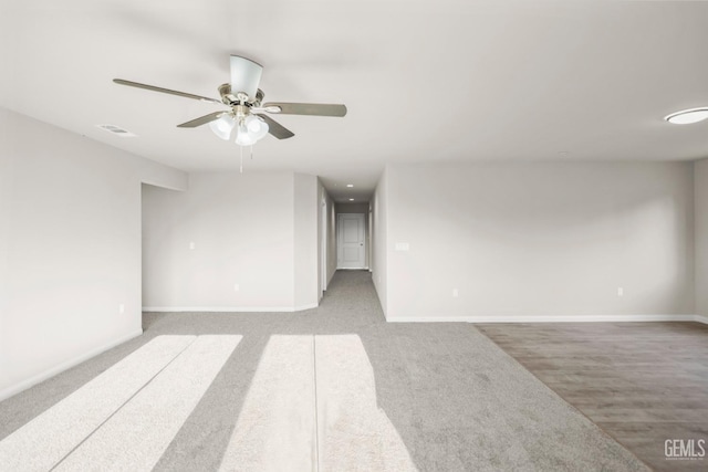 618 Poinsettia St, Bakersfield, CA 93307 - carpeted empty room featuring baseboards and a ceiling fan