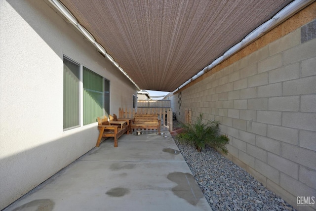 view of patio with fence
