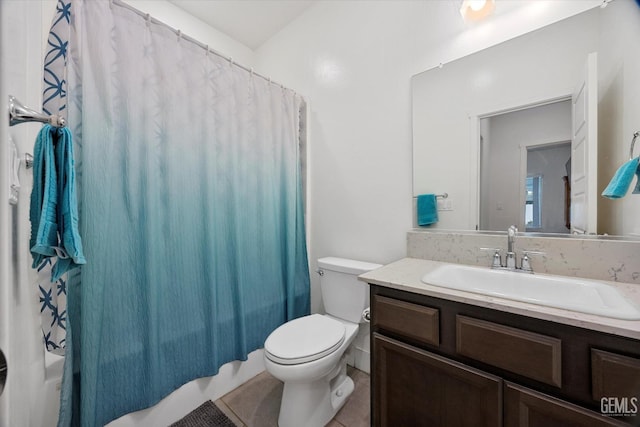 full bathroom with toilet, tile patterned flooring, shower / tub combo, and vanity