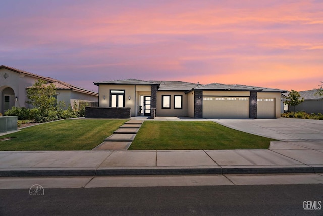 1215 Brookline Ln, Bakersfield, CA 93314 - prairie-style home with a garage, driveway, a yard, and french doors