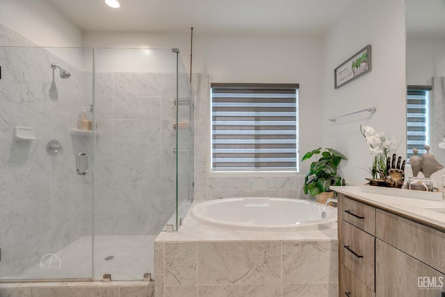 1215 Brookline Ln, Bakersfield, CA 93314 - bathroom featuring a garden tub, a stall shower, and vanity