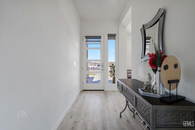1215 Brookline Ln, Bakersfield, CA 93314 - doorway to outside with light wood-style floors and baseboards