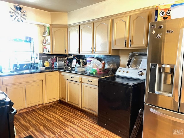 kitchen with stainless steel refrigerator with ice dispenser, light brown cabinetry, sink, and electric range oven