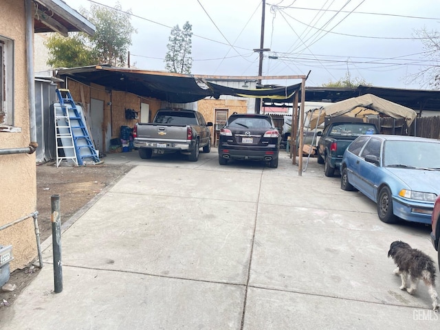 view of car parking featuring a carport