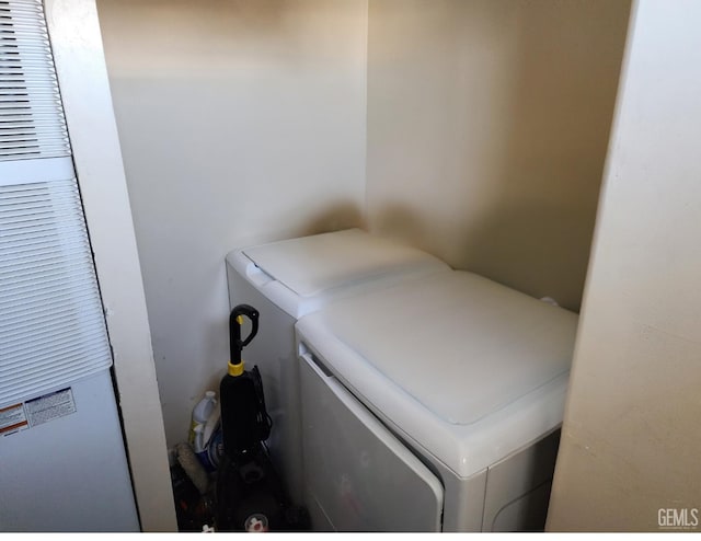 washroom featuring separate washer and dryer