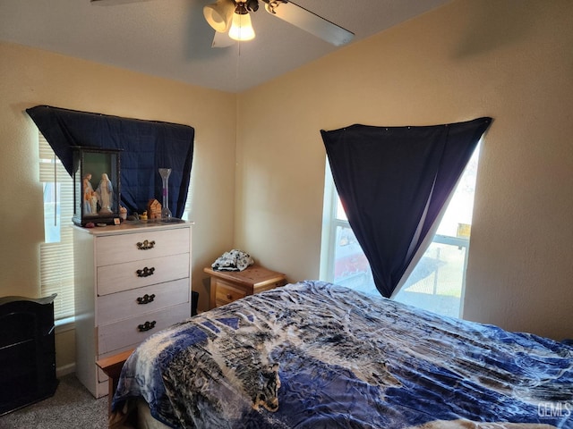 bedroom featuring carpet and ceiling fan