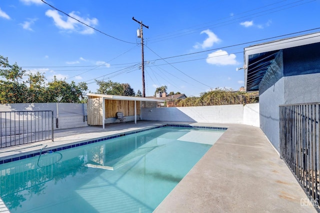 view of pool featuring a patio