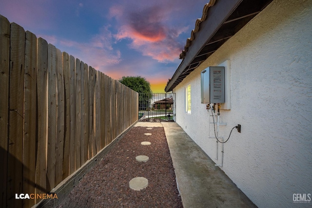 1109 Bell Ave, Taft, CA 93268 - yard at dusk featuring a gate