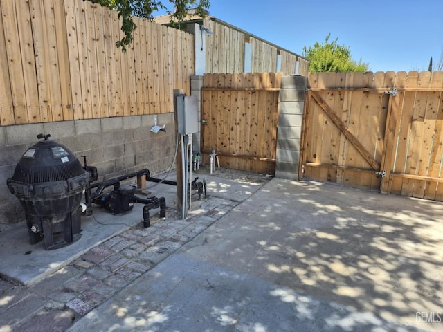 1109 Bell Ave, Taft, CA 93268 - view of patio / terrace featuring a gate