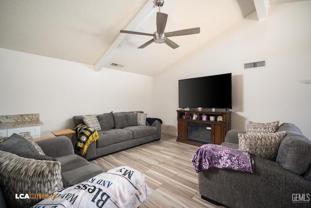 1109 Bell Ave, Taft, CA 93268 - living area featuring light wood-style floors, a ceiling fan, and a textured ceiling