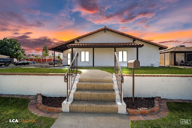 1109 Bell Ave, Taft, CA 93268 - view of front facade with a tile roof and stucco siding