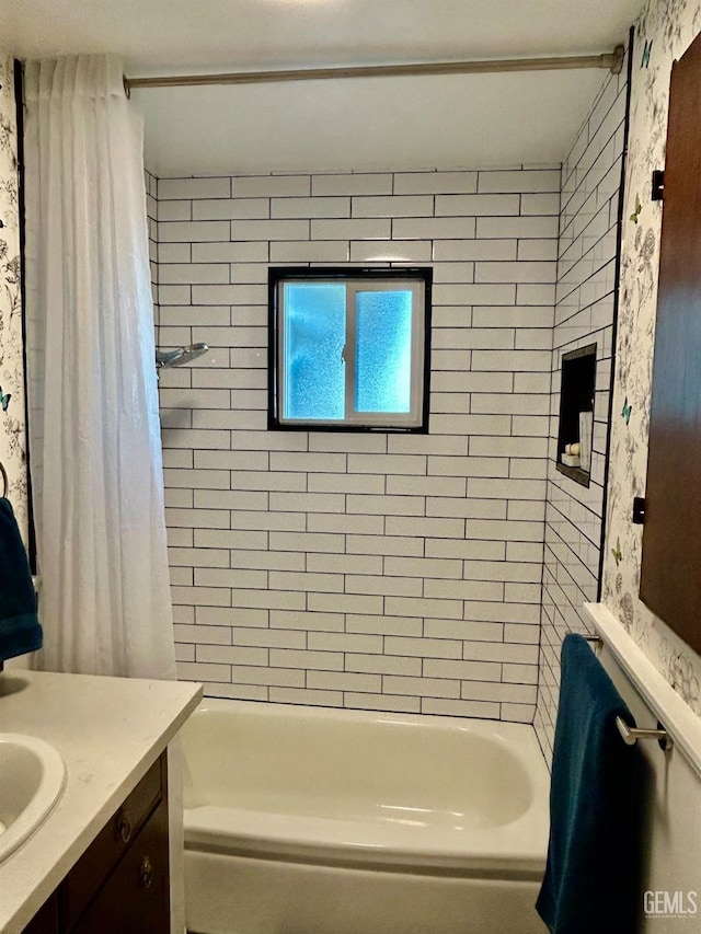 bathroom with shower / bath combination with curtain and vanity