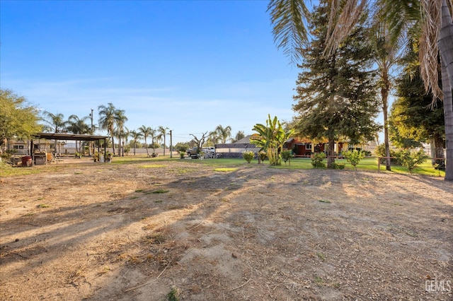 253 E Mckee Rd, Bakersfield, CA 93307 - view of yard with a detached carport