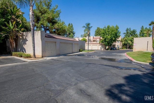 14500 Las Palmas Dr Unit 3, Bakersfield, CA 93306 - view of street with community garages and curbs