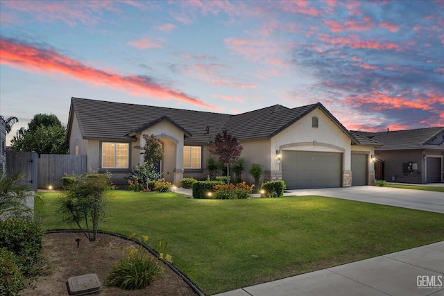 9711 Boothbay Harbour Dr, Bakersfield, CA 93314 - view of front of property featuring stucco siding, a garage, concrete driveway, stone siding, and a tile roof