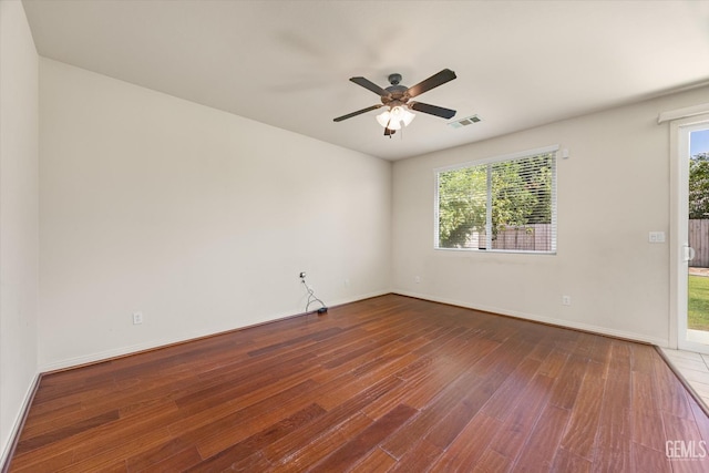 9711 Boothbay Harbour Dr, Bakersfield, CA 93314 - empty room featuring wood finished floors, ceiling fan, and baseboards