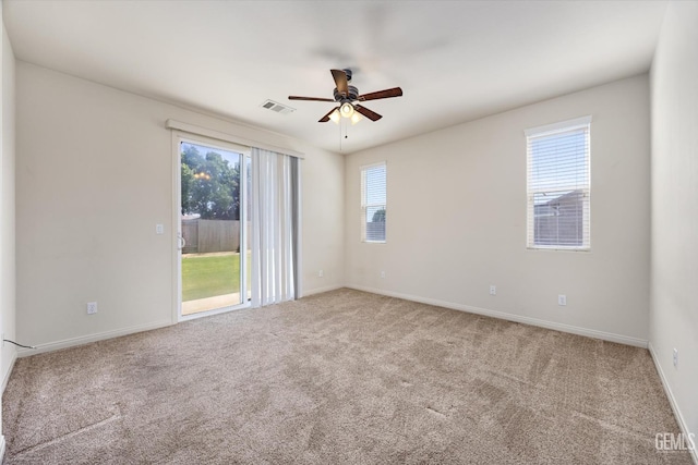 9711 Boothbay Harbour Dr, Bakersfield, CA 93314 - spare room with carpet, ceiling fan, and baseboards