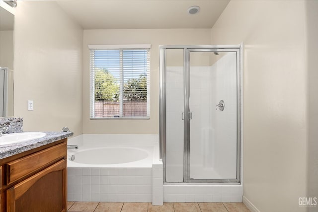9711 Boothbay Harbour Dr, Bakersfield, CA 93314 - full bath with vanity, a stall shower, tile patterned floors, and a bath