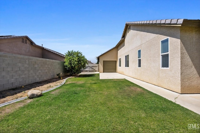 9711 Boothbay Harbour Dr, Bakersfield, CA 93314 - view of yard with a patio area and an attached garage