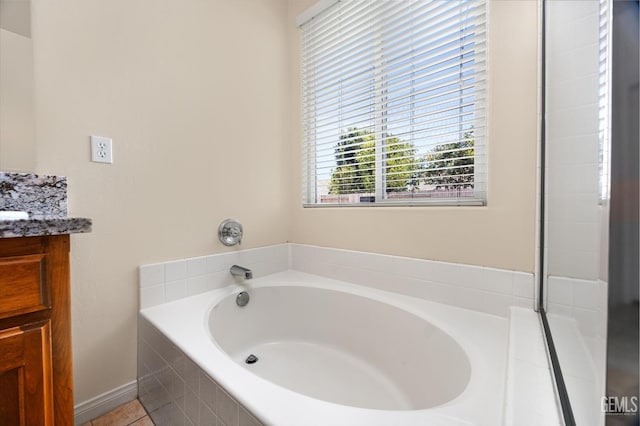 9711 Boothbay Harbour Dr, Bakersfield, CA 93314 - full bathroom with vanity and a garden tub