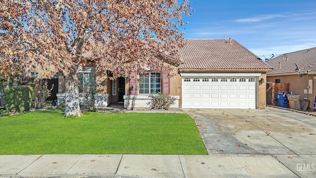 view of front facade with a front yard and a garage