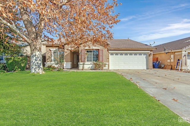 view of front of house with a front yard and a garage