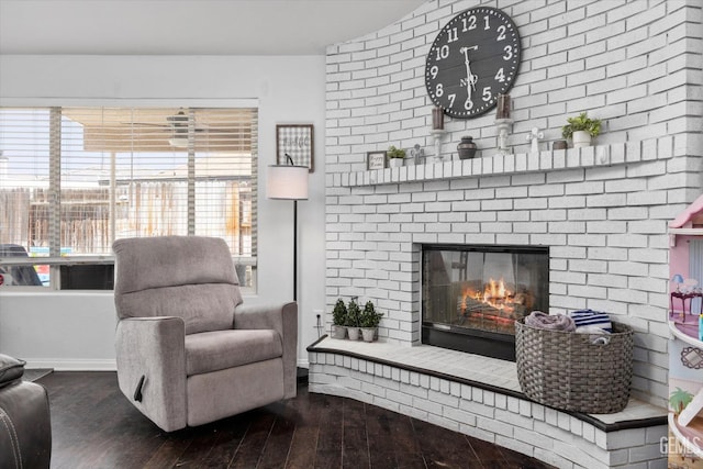 5812 Seasons Valley Ct, Bakersfield, CA 93313 - living room featuring wood-type flooring and a brick fireplace