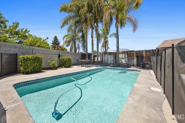 5812 Seasons Valley Ct, Bakersfield, CA 93313 - view of swimming pool with a fenced backyard and a patio