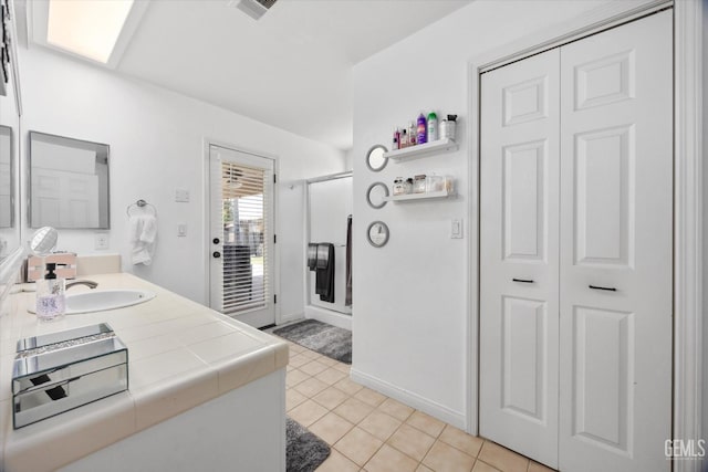 5812 Seasons Valley Ct, Bakersfield, CA 93313 - bathroom featuring a closet, a stall shower, vanity, and tile patterned floors