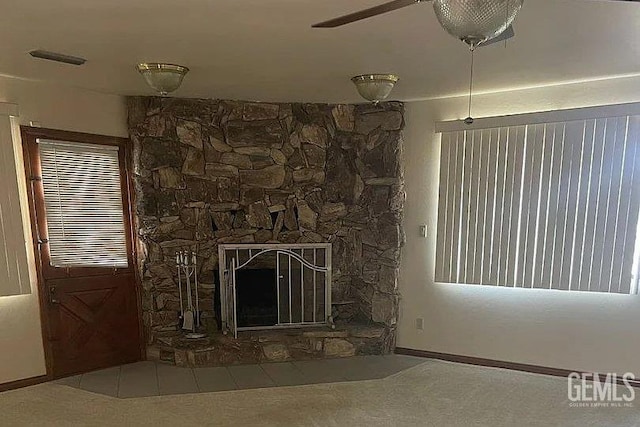 12606 Stradley Ave, Mc Farland, CA 93250 - detailed view of a ceiling fan and a stone fireplace