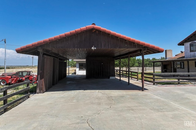 12606 Stradley Ave, Mc Farland, CA 93250 - view of car parking featuring driveway and an exterior structure