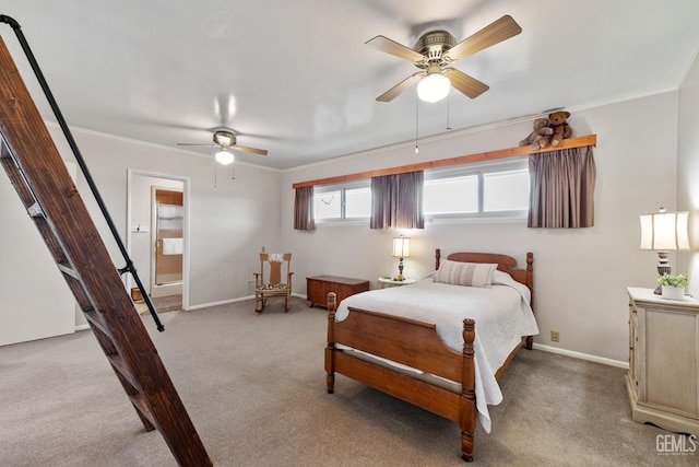 carpeted bedroom with ceiling fan and crown molding