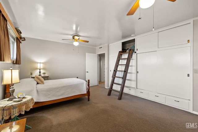 carpeted bedroom featuring ceiling fan