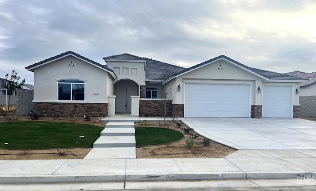 view of front of property featuring a garage