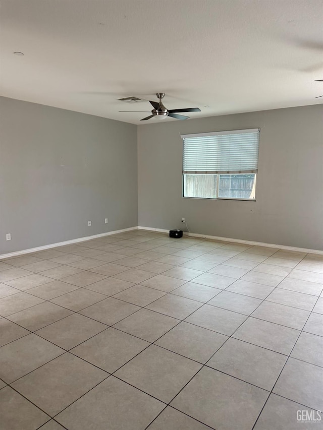 6511 Epley Ct, Bakersfield, CA 93313 - unfurnished room featuring ceiling fan, baseboards, and light tile patterned floors