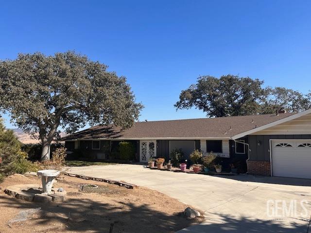 ranch-style home with a garage