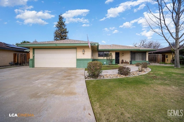 single story home featuring a garage and a front lawn