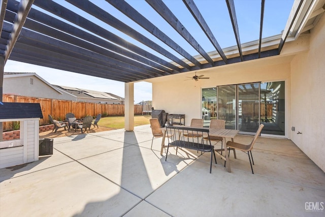 view of patio / terrace featuring ceiling fan and a pergola