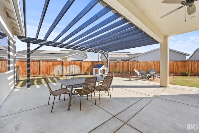 view of patio / terrace with a pergola and ceiling fan